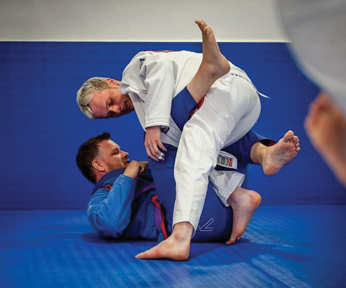 Two men practicing Brazilian Jiu-Jitsu